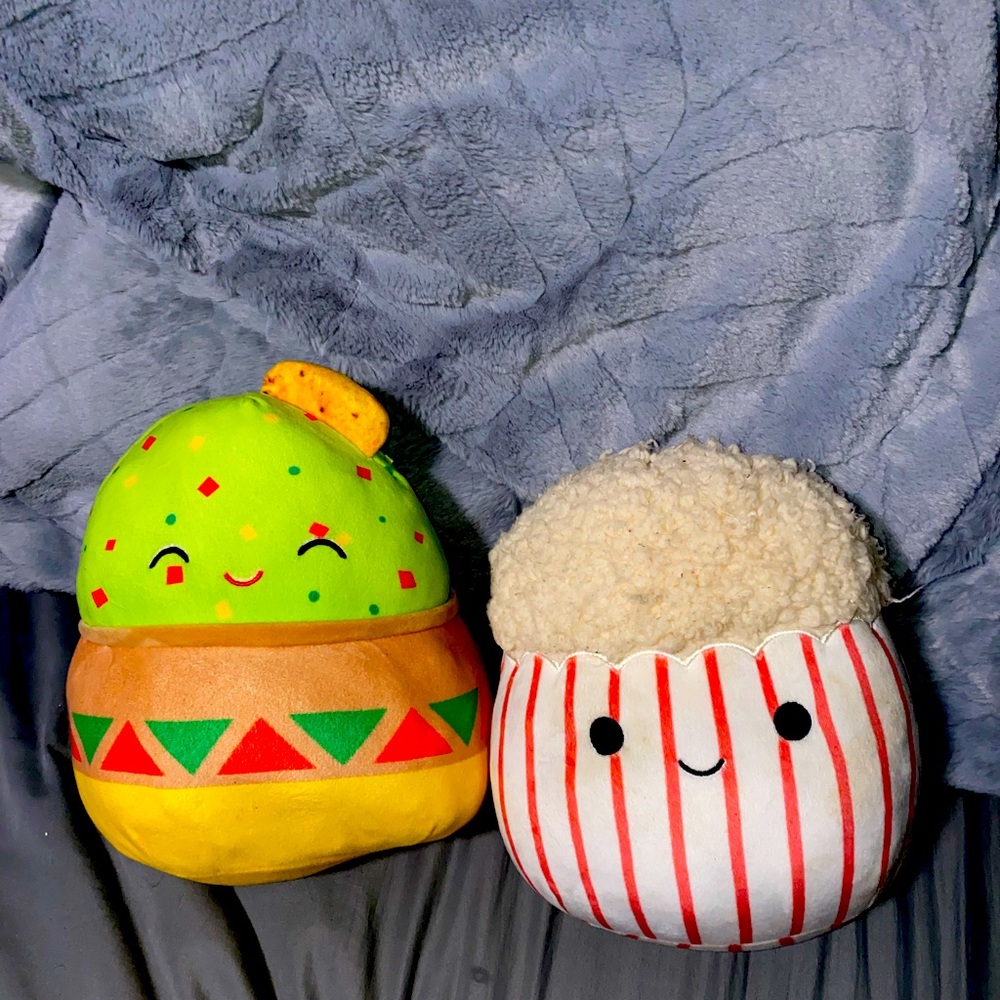 2 squishmallows, popcorn and a taco